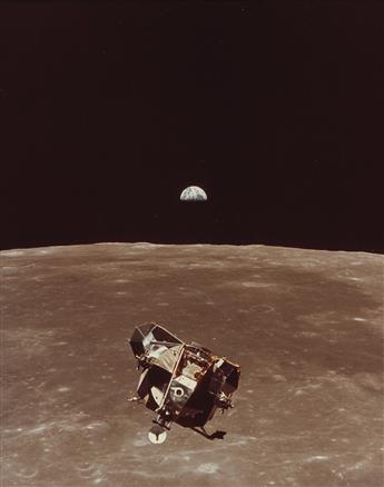 (MISSION TO THE MOON) Apollo Missions presentation album with 20 color photographs, including the iconic Blue Marble and Apollo 11.